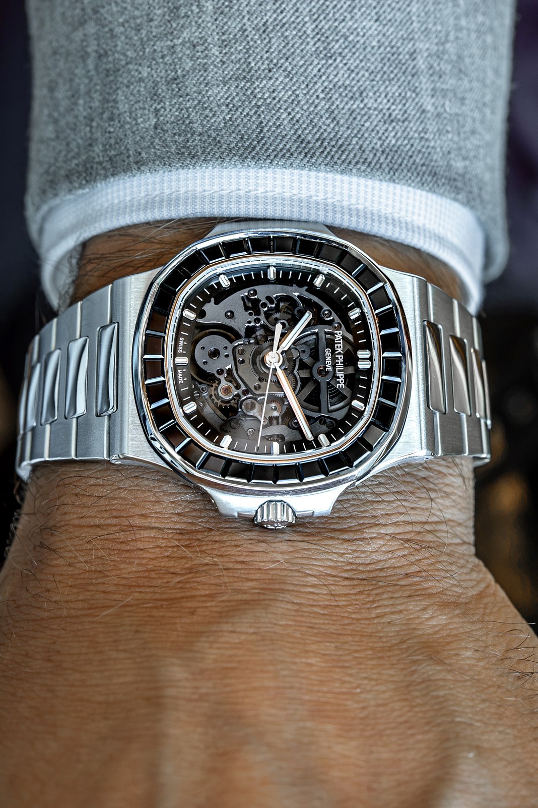 The Black Stone worn, seen straight on, with black spinels around the dial and the openworked calibre behind it