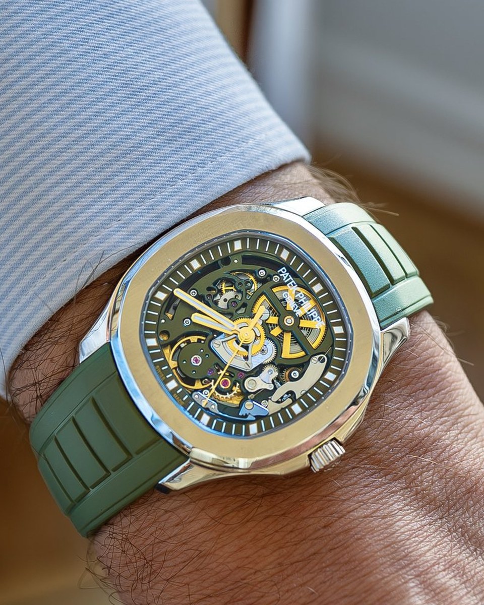 The Eternal Green on the wrist: an openworked Aquanaut with a green-finished movement and yellow-gold-treated hands, on a green rubber strap