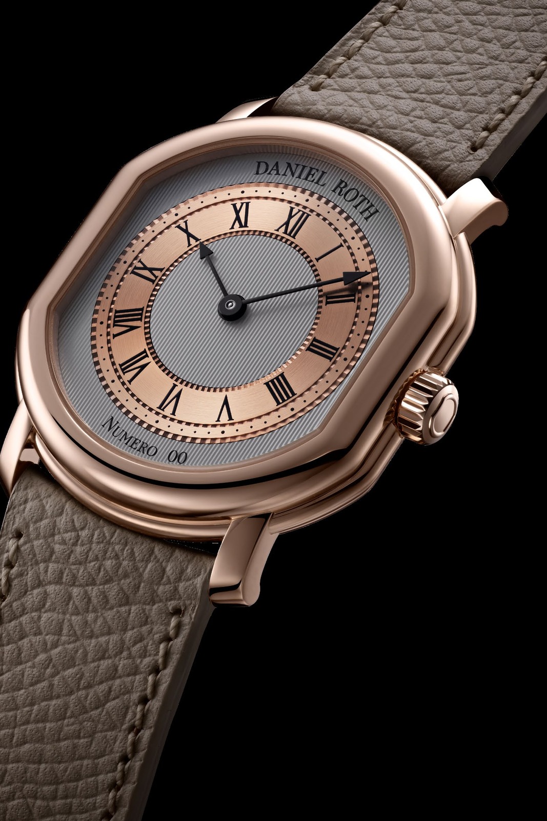 Daniel Roth Extra Plat Rose Gold on a taupe leather strap against a black background: double-ellipse rose-gold case, two-tone guilloché dial, black Roman numerals, individual number line at six