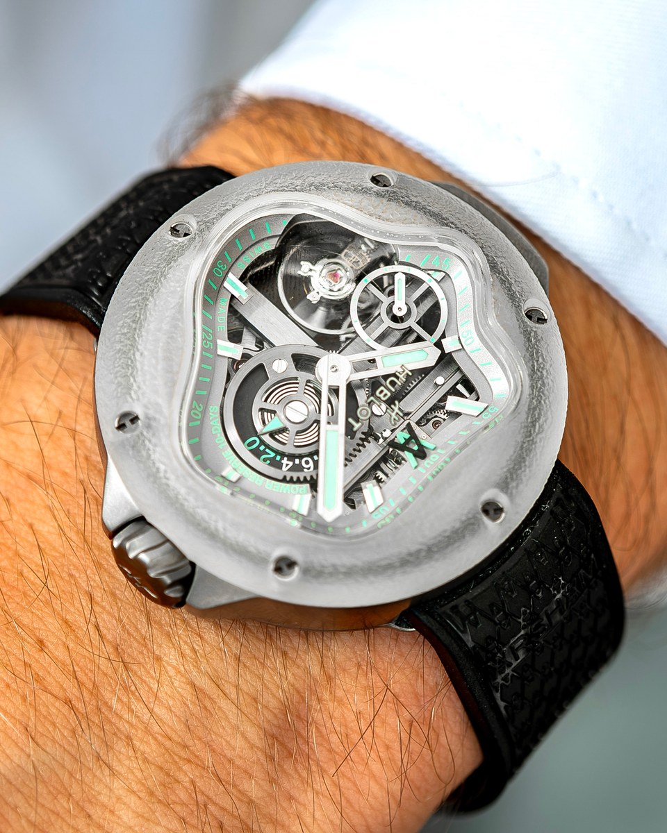 Hublot MP-17 Meca-10 Arsham Splash on a wrist: sandblasted titanium case in the shape of a splash, skeleton movement with mint-green accents, black rubber strap with the Arsham monogram pressed into it