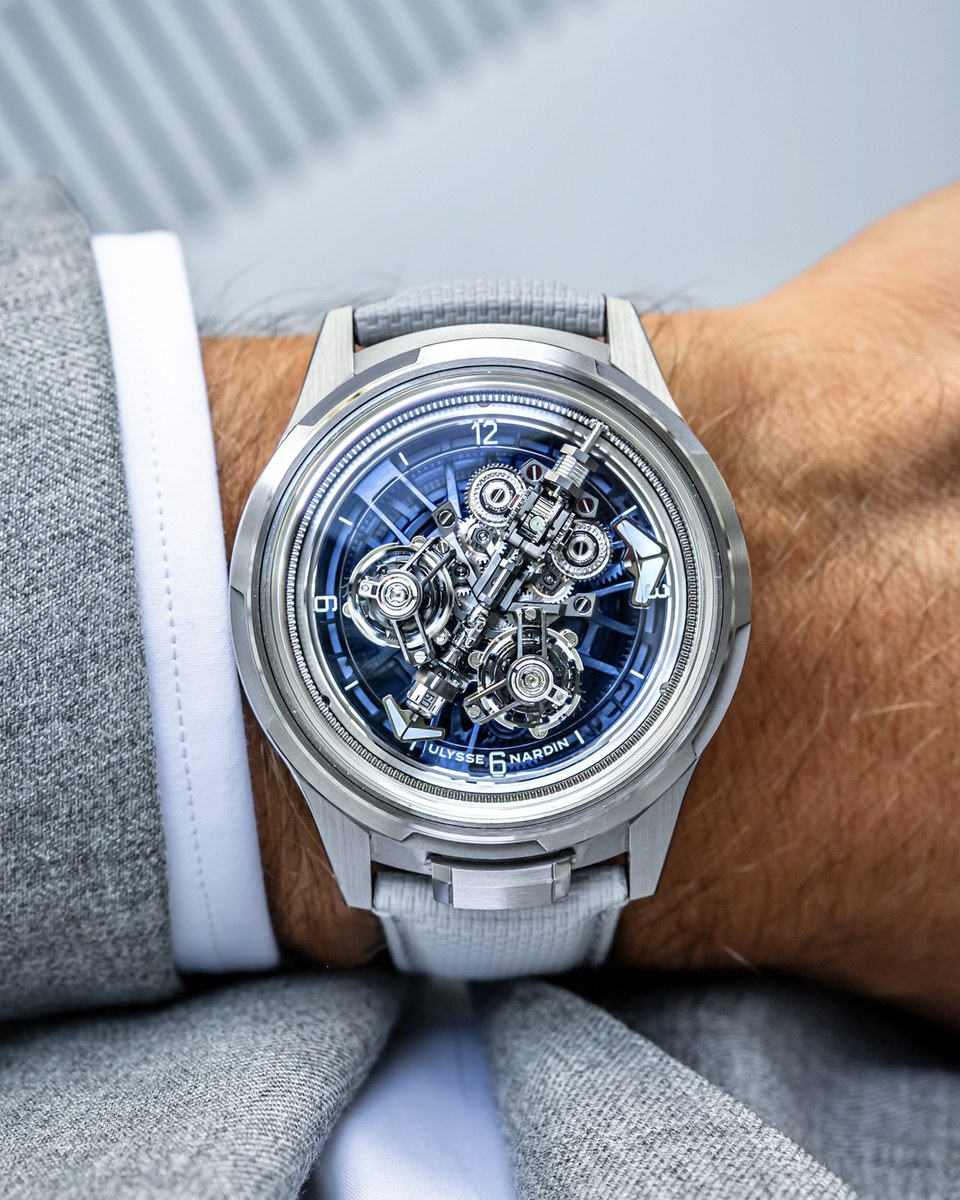 Ulysse Nardin Super Freak worn, seen straight on, with the central minute bridge, blue hour disc and twin tourbillons